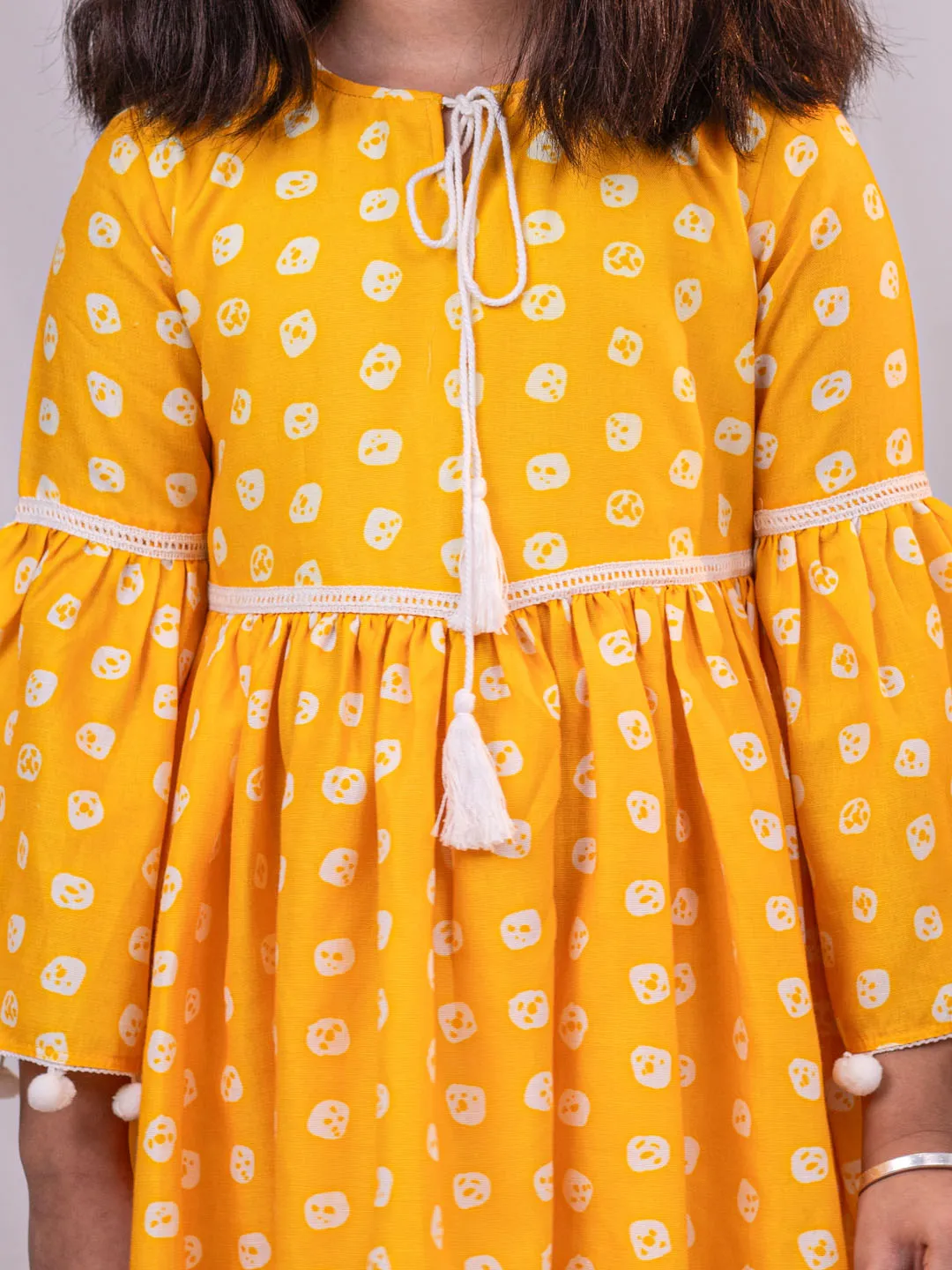 Jashvi Girl's Yellow Printed Ruffle Kurta With Leggings Set