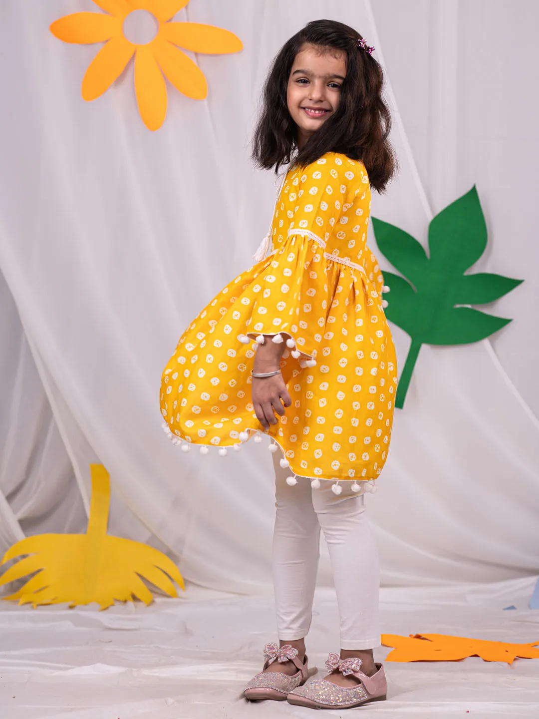 Jashvi Girl's Yellow Printed Ruffle Kurta With Leggings Set