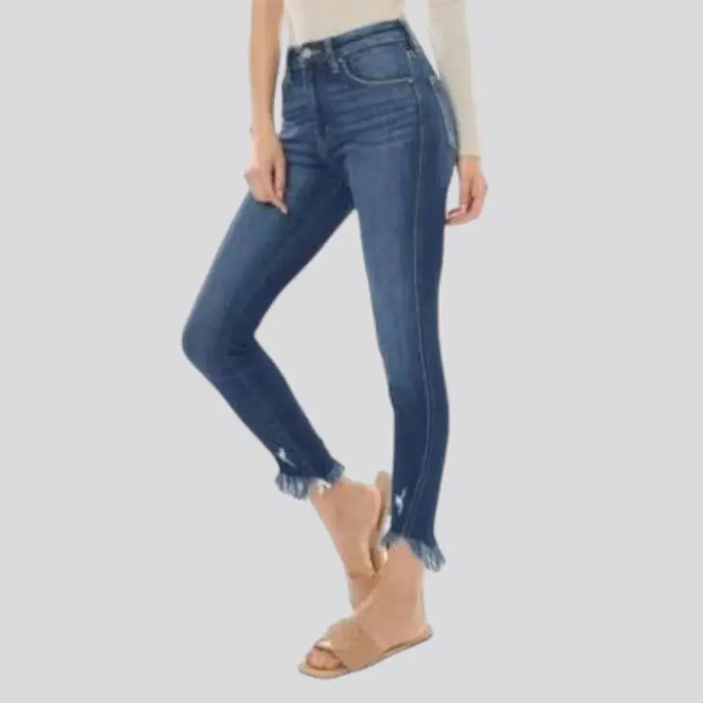 Medium-wash skinny jeans
 for ladies