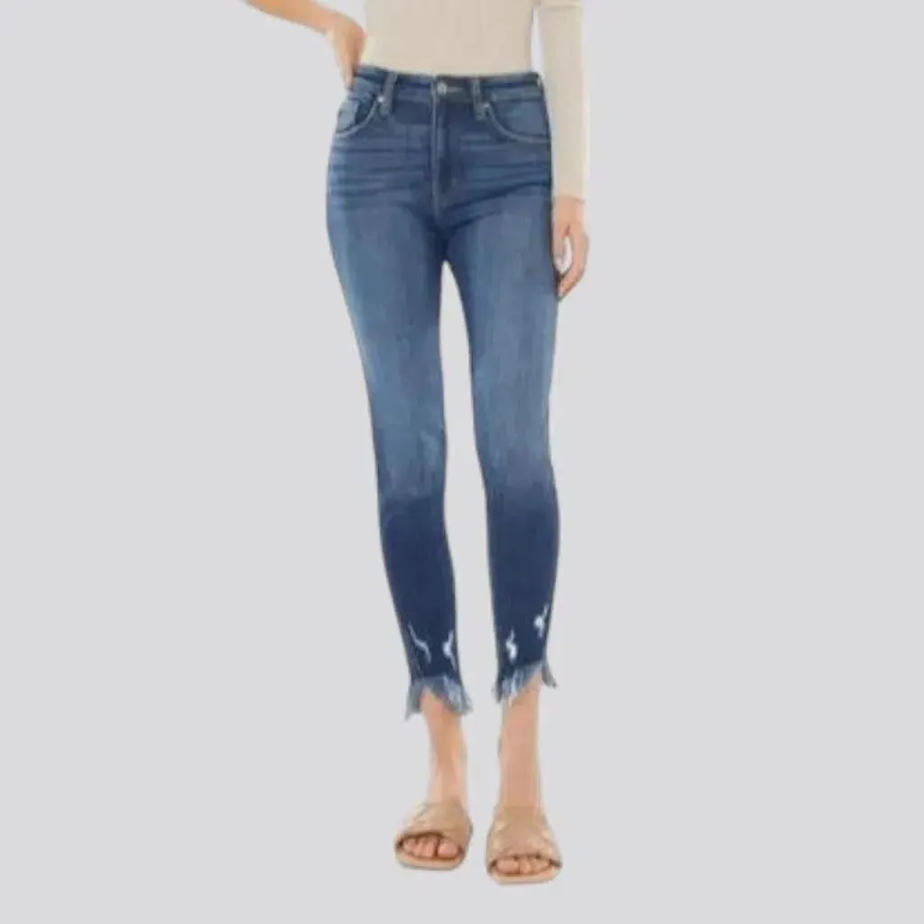 Medium-wash skinny jeans
 for ladies