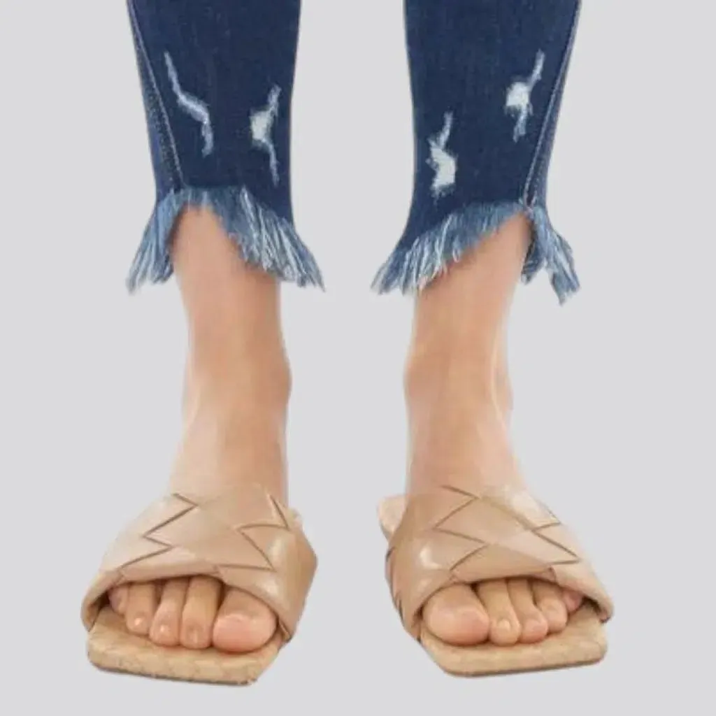 Medium-wash skinny jeans
 for ladies
