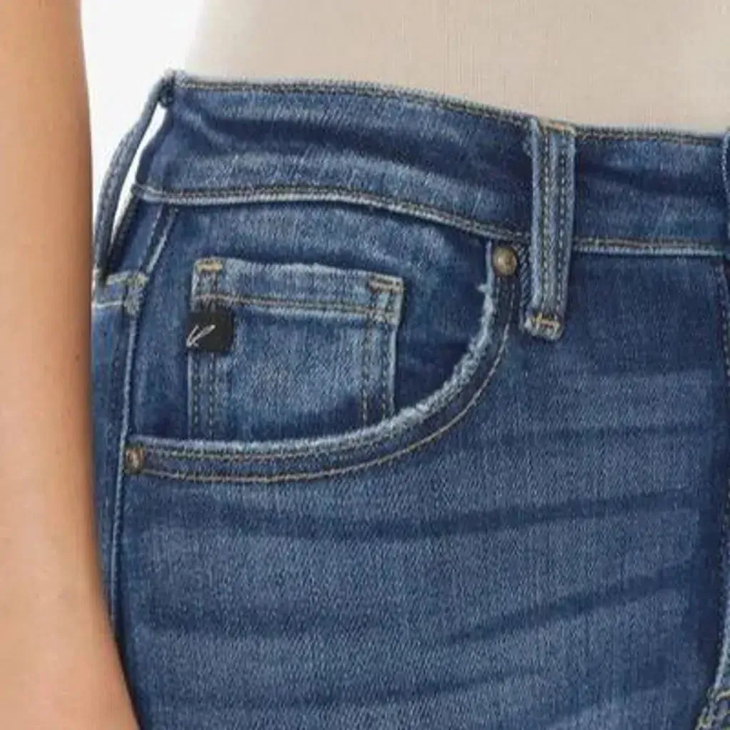 Medium-wash skinny jeans
 for ladies