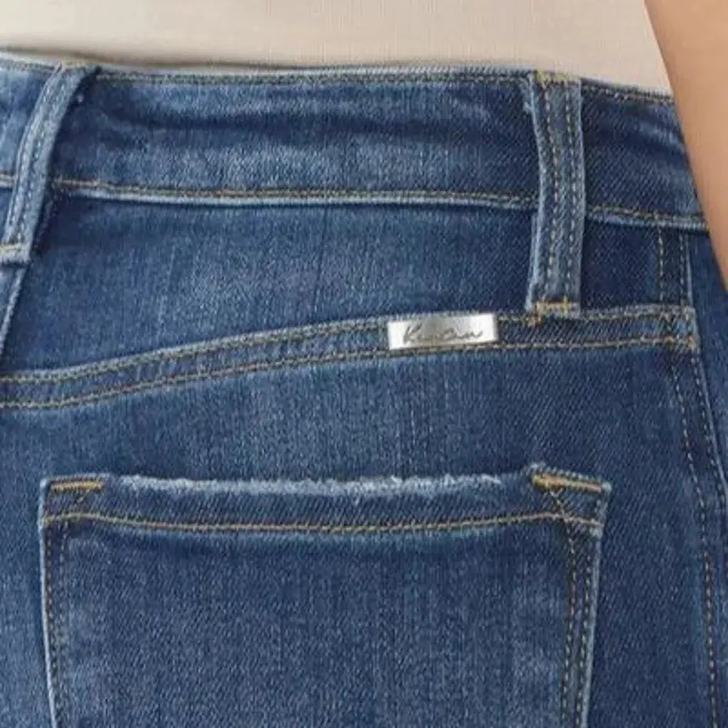 Medium-wash skinny jeans
 for ladies